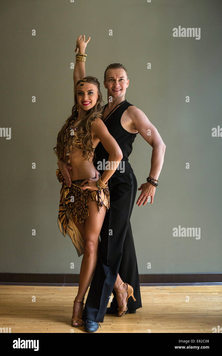 A man and woman dancing together in a dance studio. Stock Photo