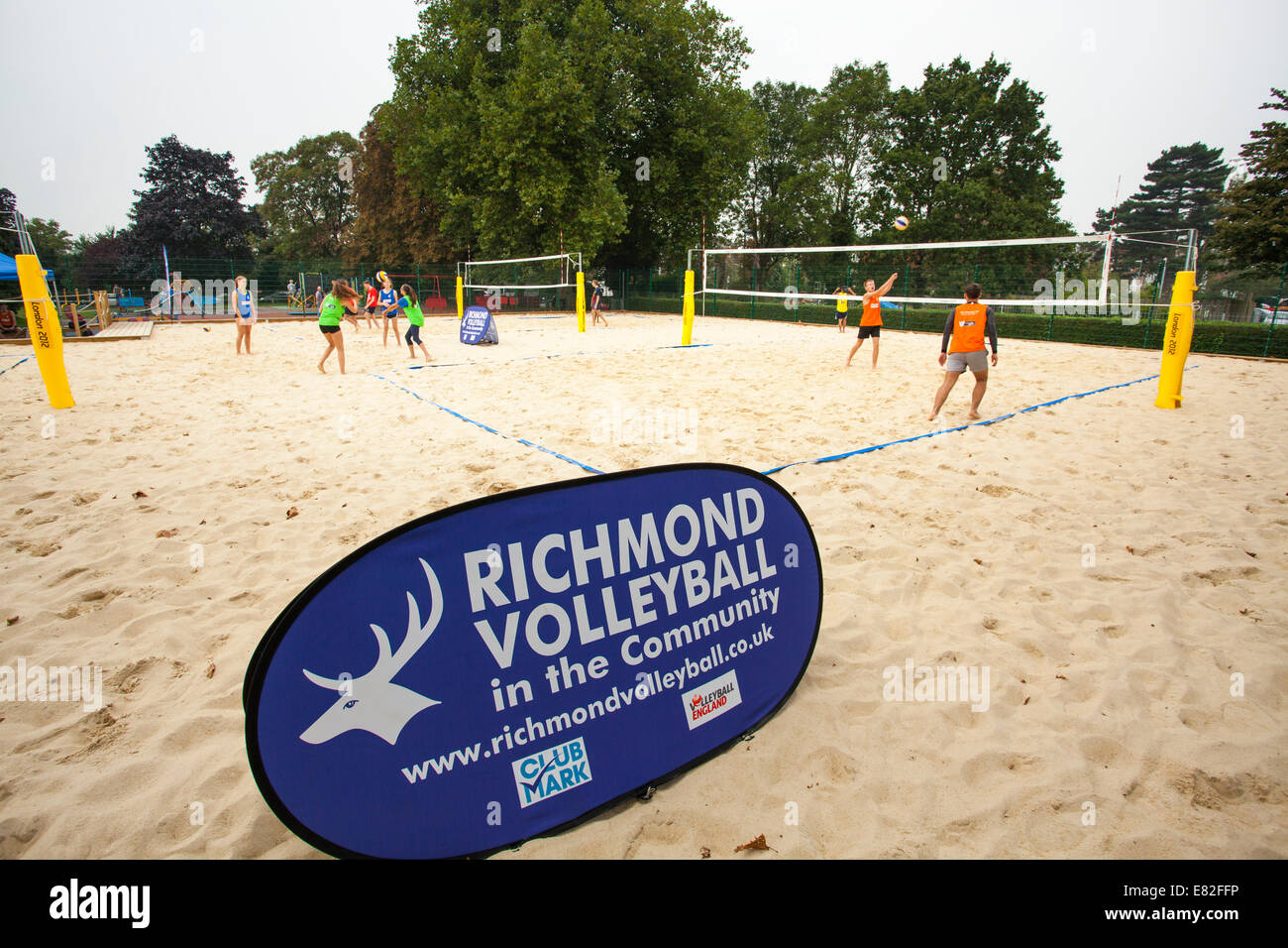 People playing on Richmond beach volleyball court. Stock Photo