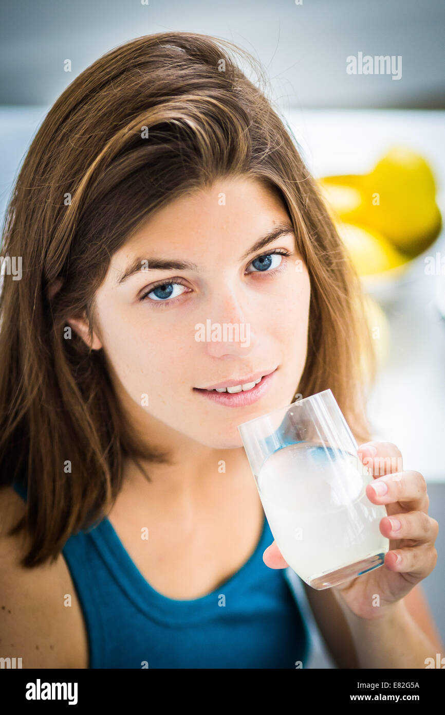 Woman drinking freshly squeezed lemon juice Stock Photo Alamy