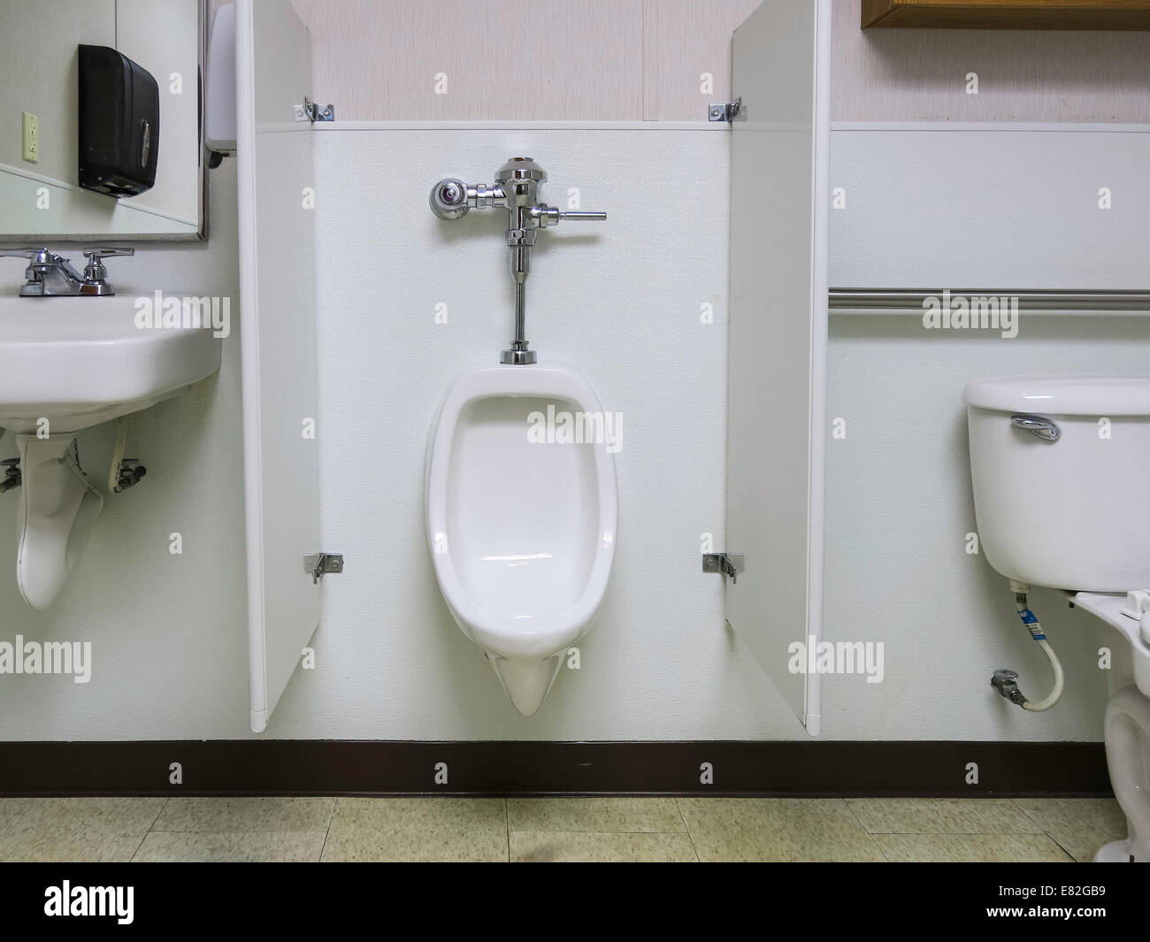 Unisex and Wheelchair Accessible Public Restroom. USA Stock Photo