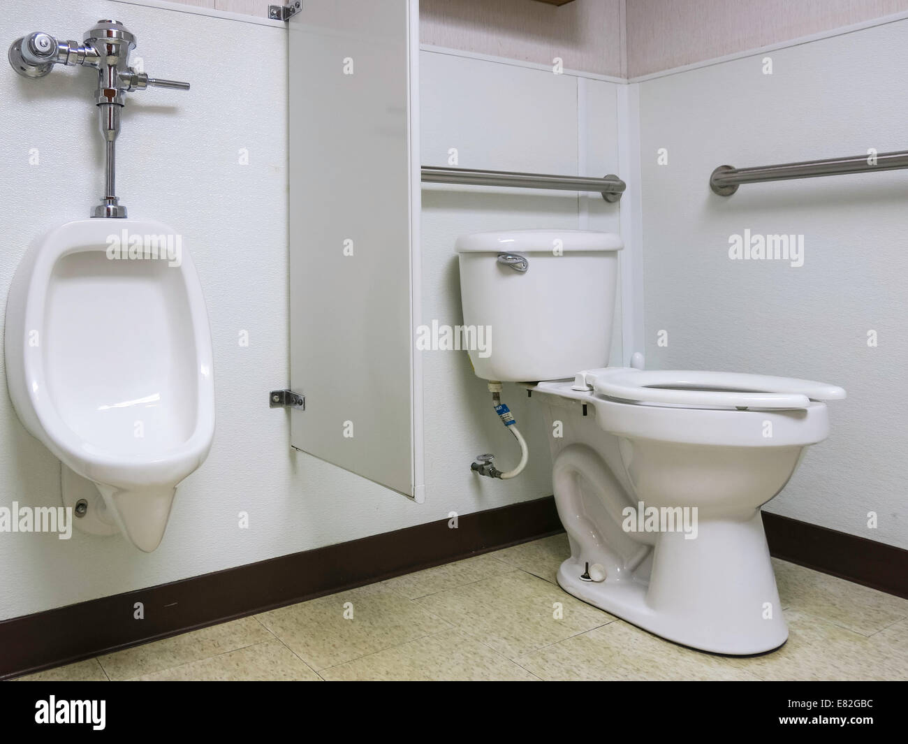 Unisex and Wheelchair Accessible Public Restroom. USA Stock Photo