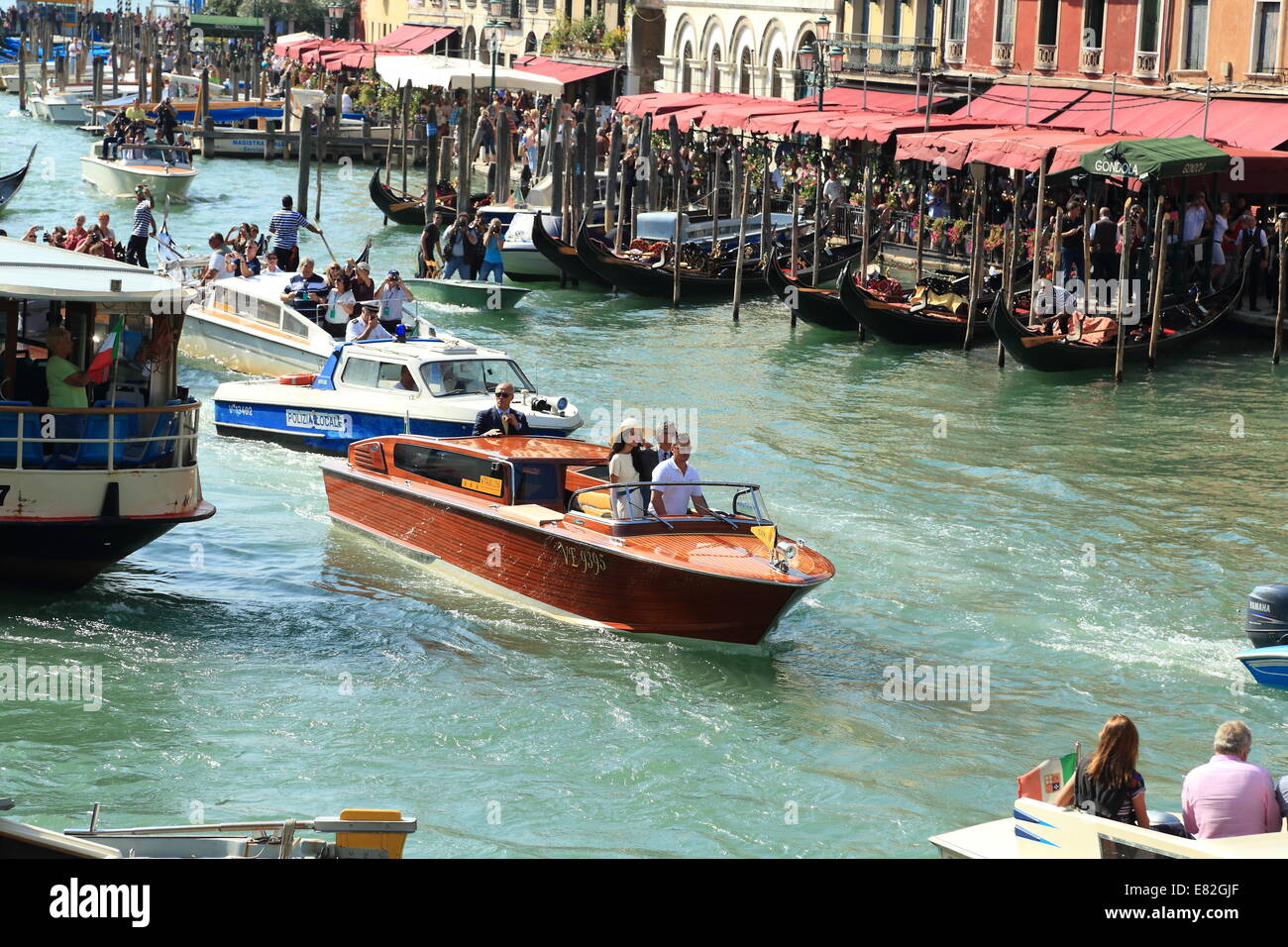 Venice, Italy. 29th Sep, 2014. Actor George Clooney and lawyer Amal Alamuddin arrive for their civil ceremony in Venice. Stock Photo