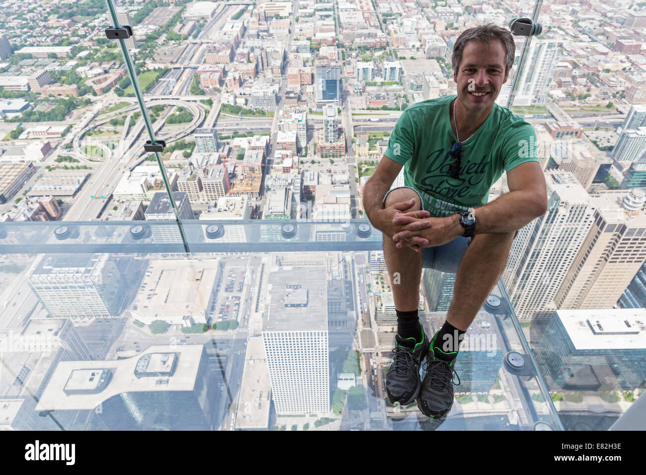 Chicago, Illinois, Chicago, Tourist on glass balcony of Willis Tower Stock Photo