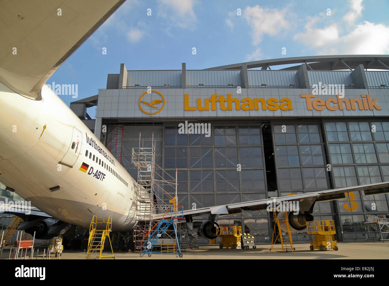 Germany, Hamburg, Lufthansa Technik Hangar at Hamburg Airport with plane Stock Photo