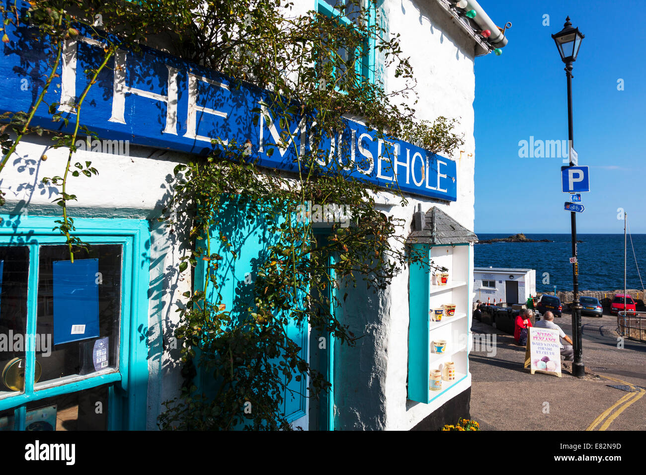 The Mousehole shop in Mousehole village Cornwall Cornish west country typical dramatic coast coastal Stock Photo