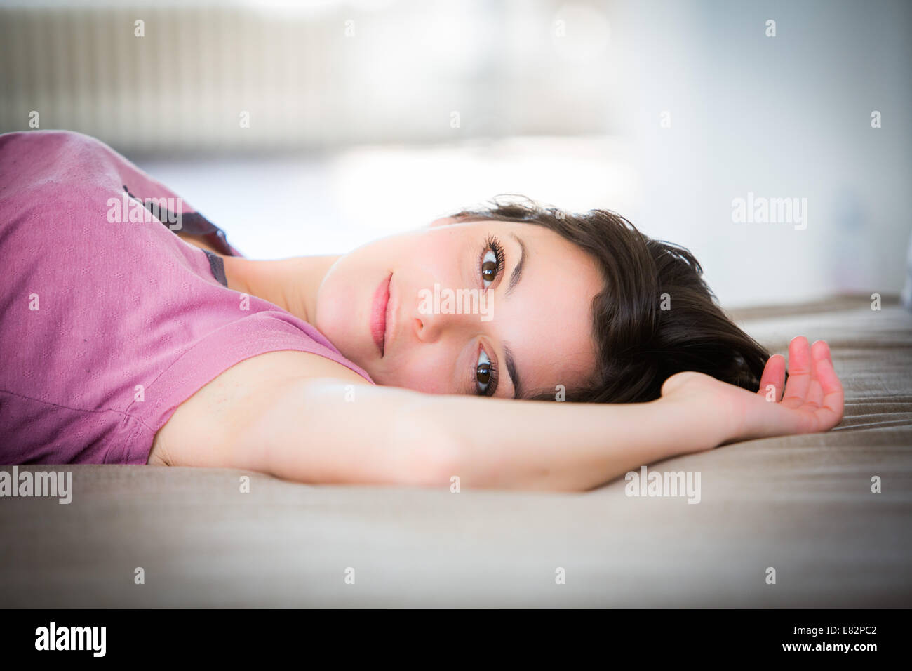 Woman lying down. Stock Photo
