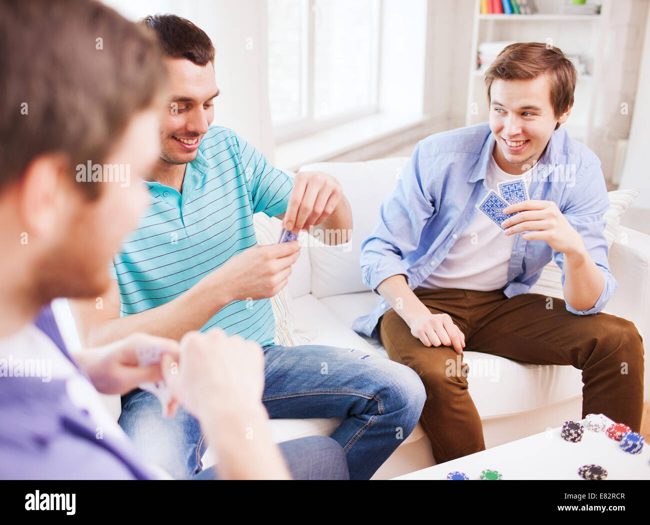 Playing cards at home hi-res stock photography and images - Alamy