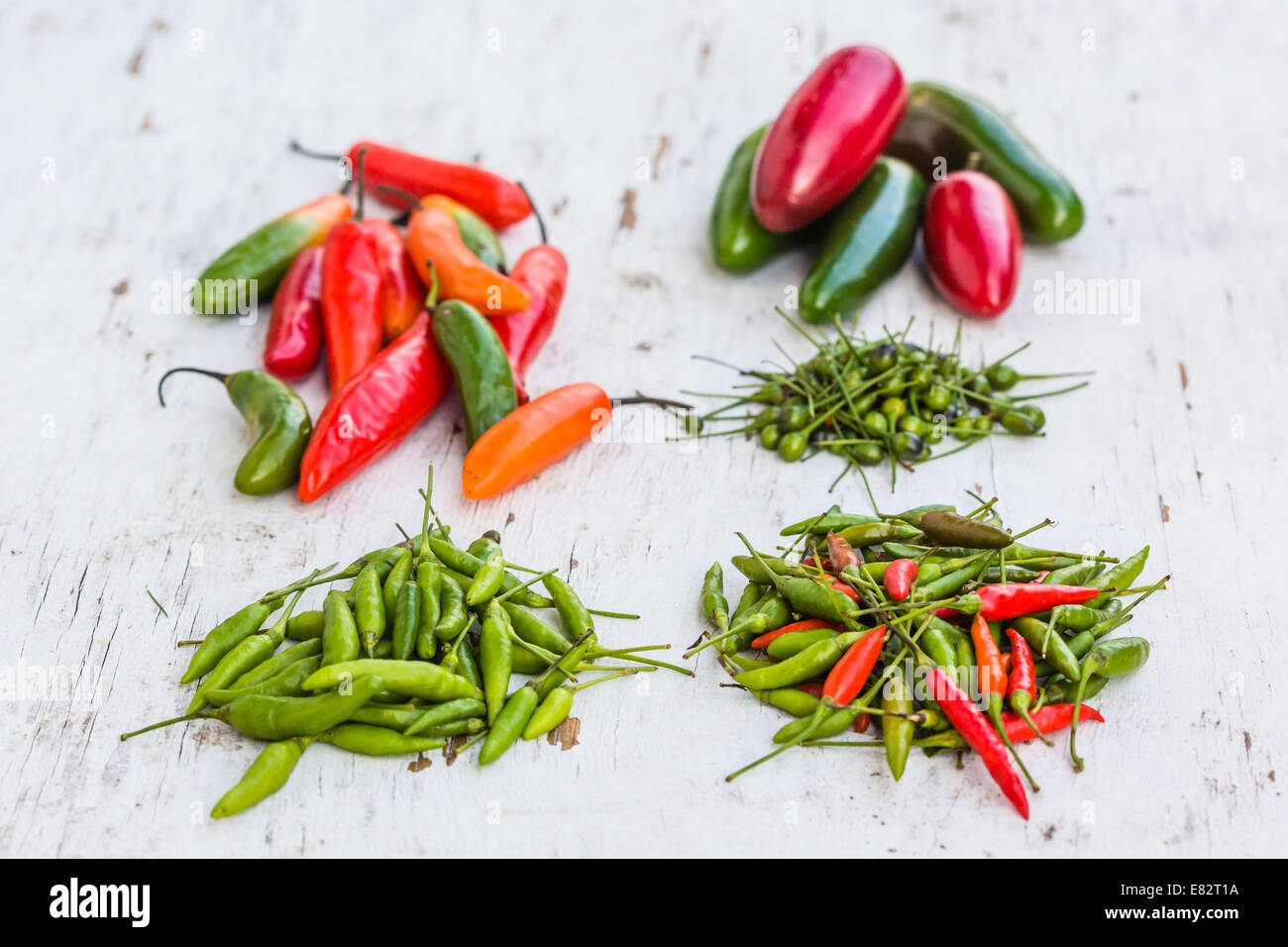 Red and green chilli peppers. Stock Photo