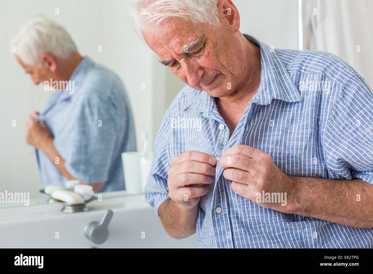 Man dressing Stock Photo Alamy