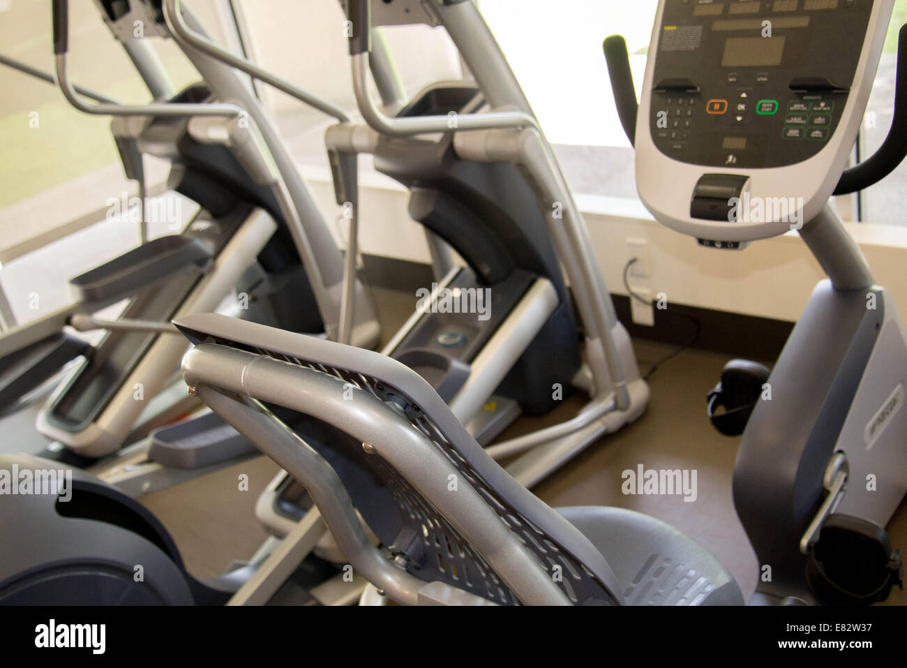 gym equipment for exercise, stationary bicycles, elliptical machine