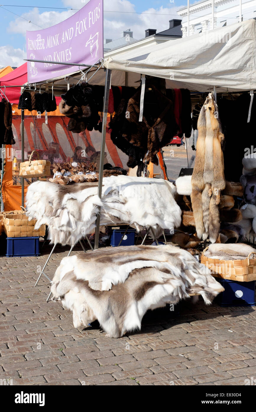 Finland, Helsinki, Linnanallas basin. Reindeer, fox and mink skins for sale in the Market Stock Photo