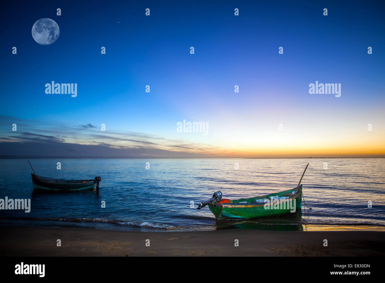 a fishboat in naila lagoon on sunset Stock Photo