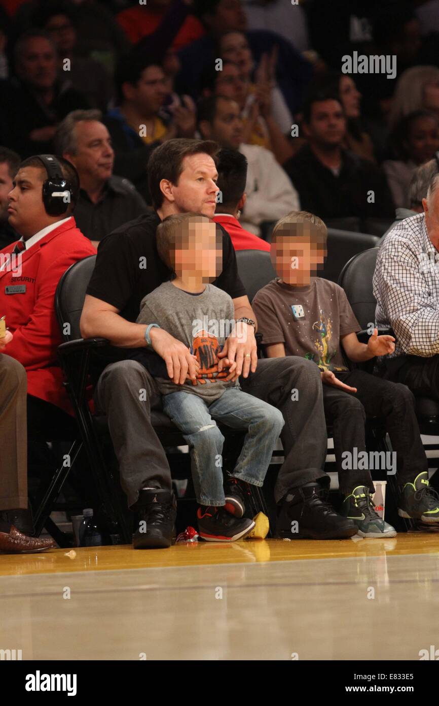 Celebrities at the Lakers game. The Los Angeles Lakers defeated the New York Knicks by the final score of 127-96 at Staples Center  Featuring: Mark Wahlberg,Brendan Joseph Wahlberg,Michael Robert Wahlberg Where: Los Angeles, California, United States When: 25 Mar 2014 Stock Photo