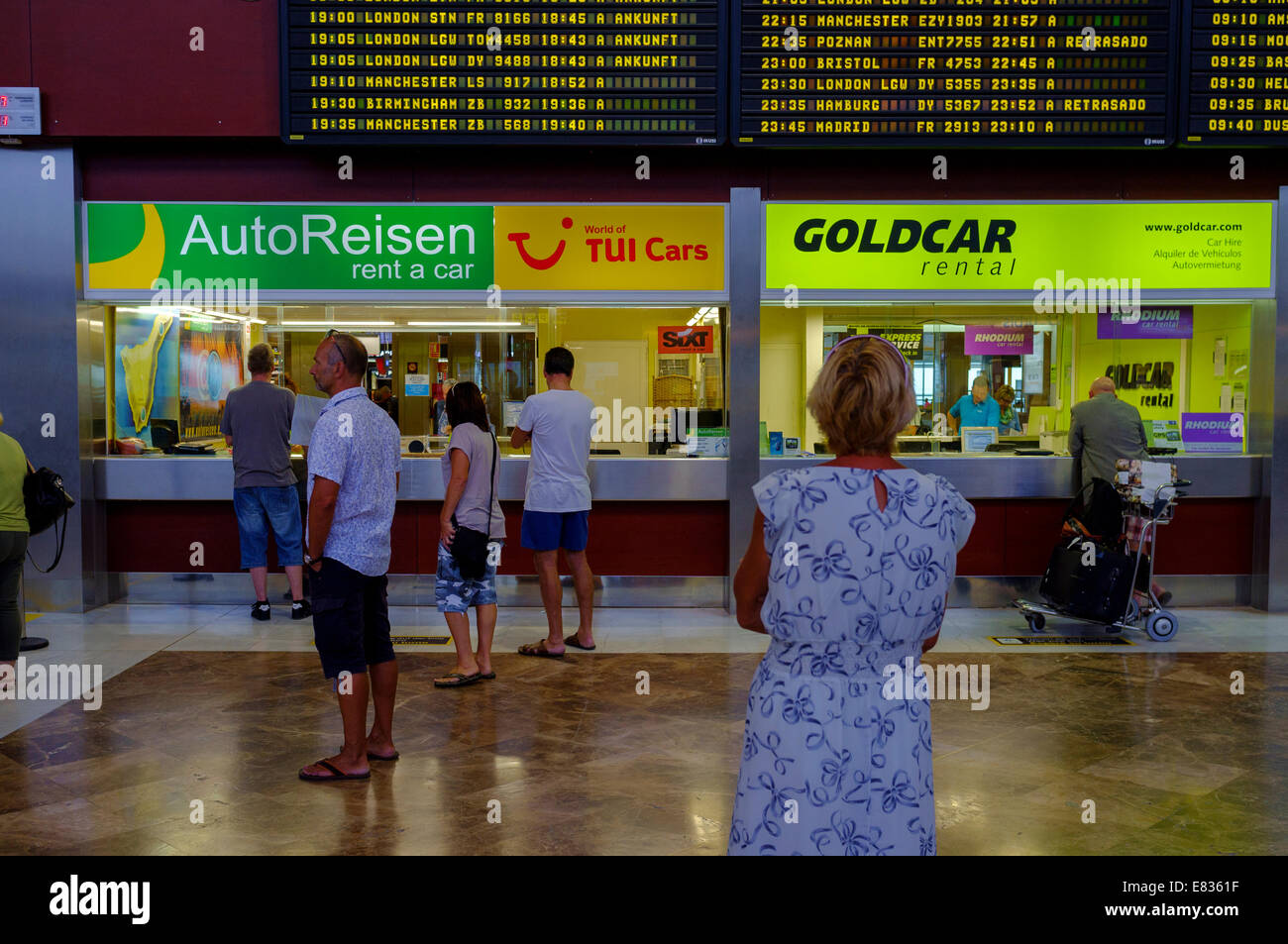Car hire company sales desks at Tenerife Sur airport, Canary Islands, Spain. Stock Photo