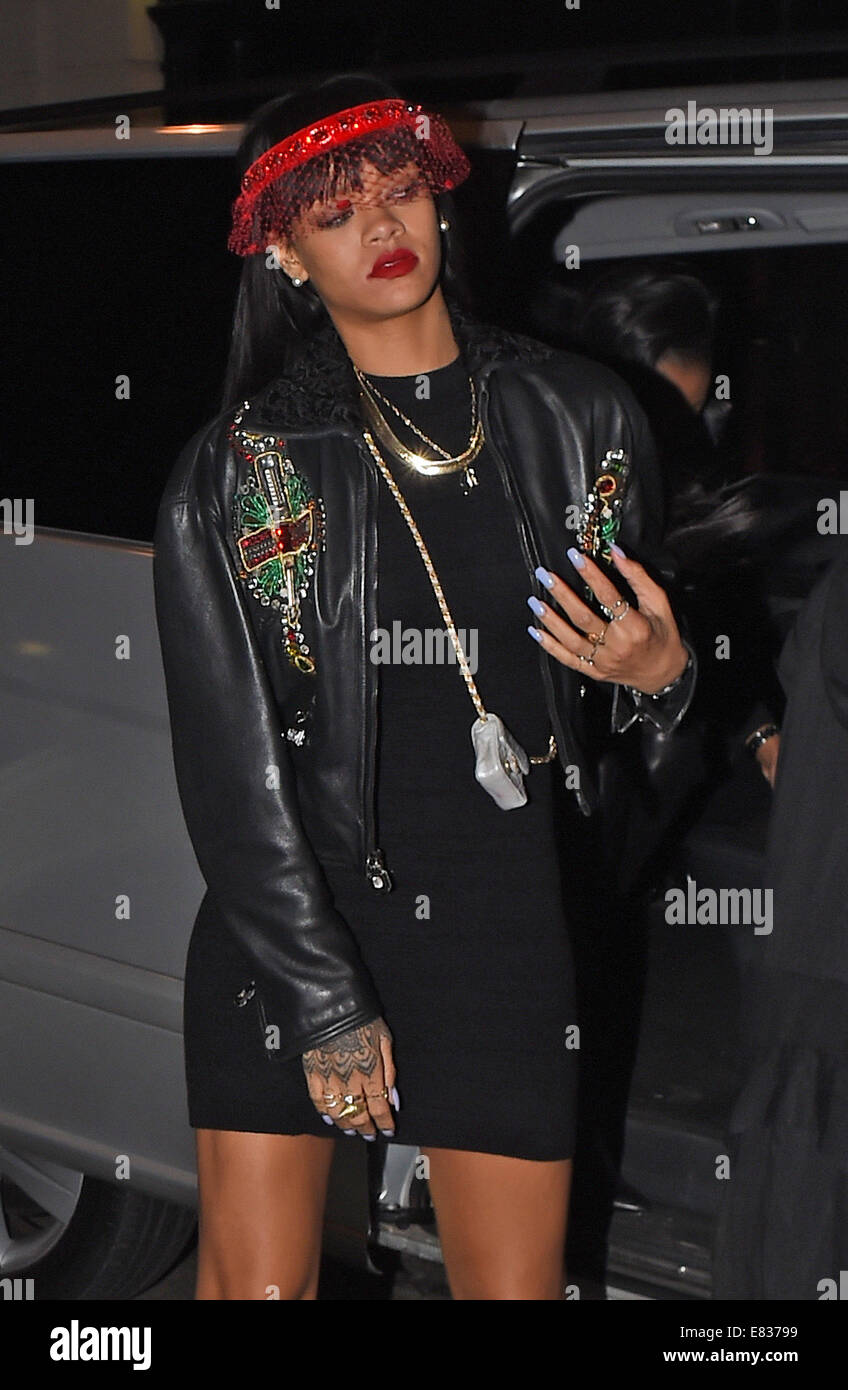 Rihanna seen leaving Tramps Nightclub at 4am on the same night as Drake partyied at another nightclub. Rihanna was seen arriving and leaving Tramps nightclub alone with Drake no where to be seen.  Featuring: Rihanna Where: London, United Kingdom When: 27 Mar 2014 Stock Photo