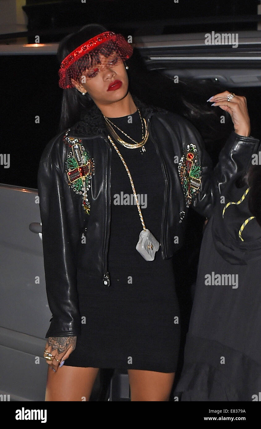 Rihanna seen leaving Tramps Nightclub at 4am on the same night as Drake partyied at another nightclub. Rihanna was seen arriving and leaving Tramps nightclub alone with Drake no where to be seen.  Featuring: Rihanna Where: London, United Kingdom When: 27 Mar 2014 Stock Photo