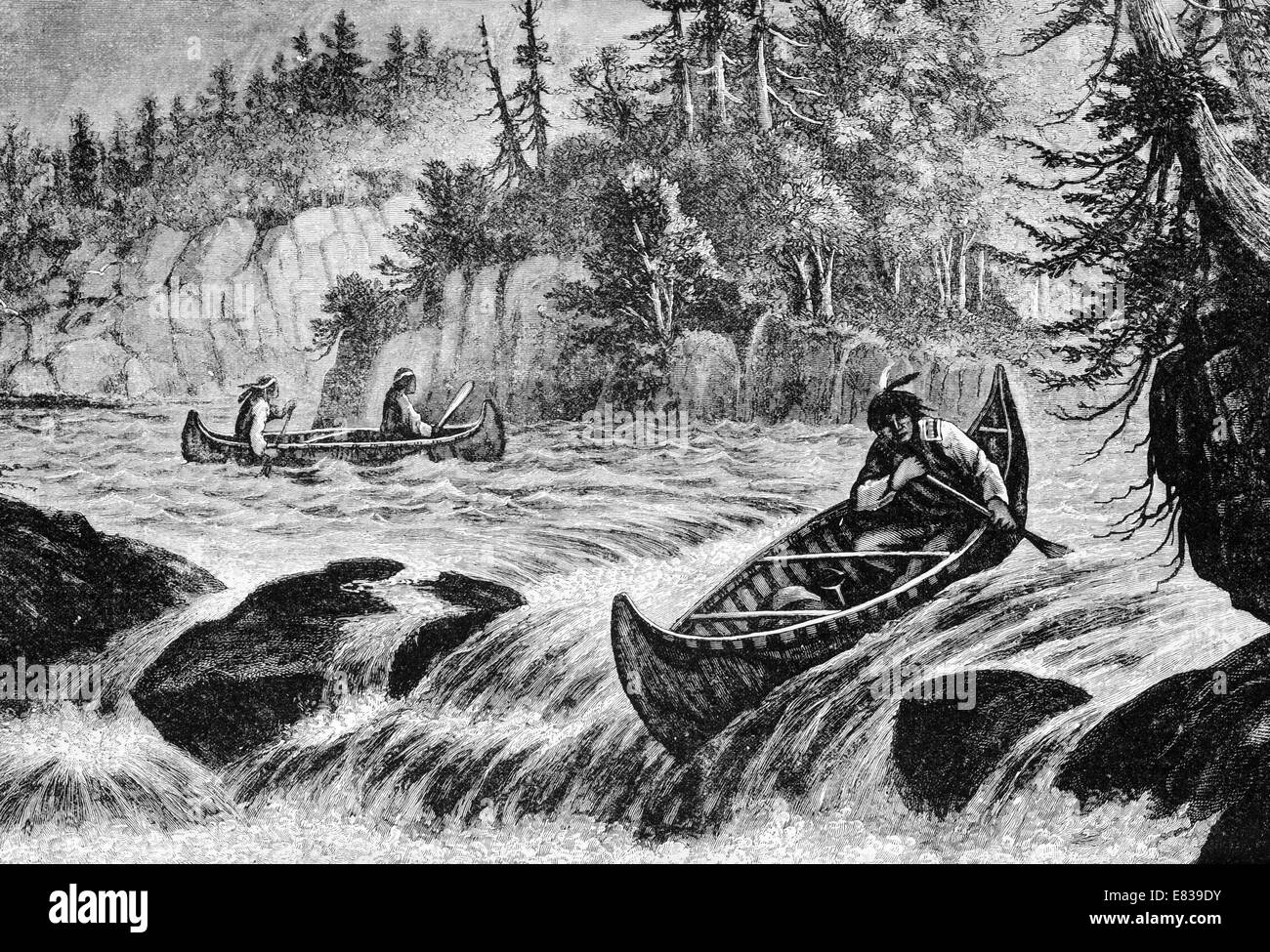 North American Indian skin Canoe shooting river rapids circa 1885 Stock Photo
