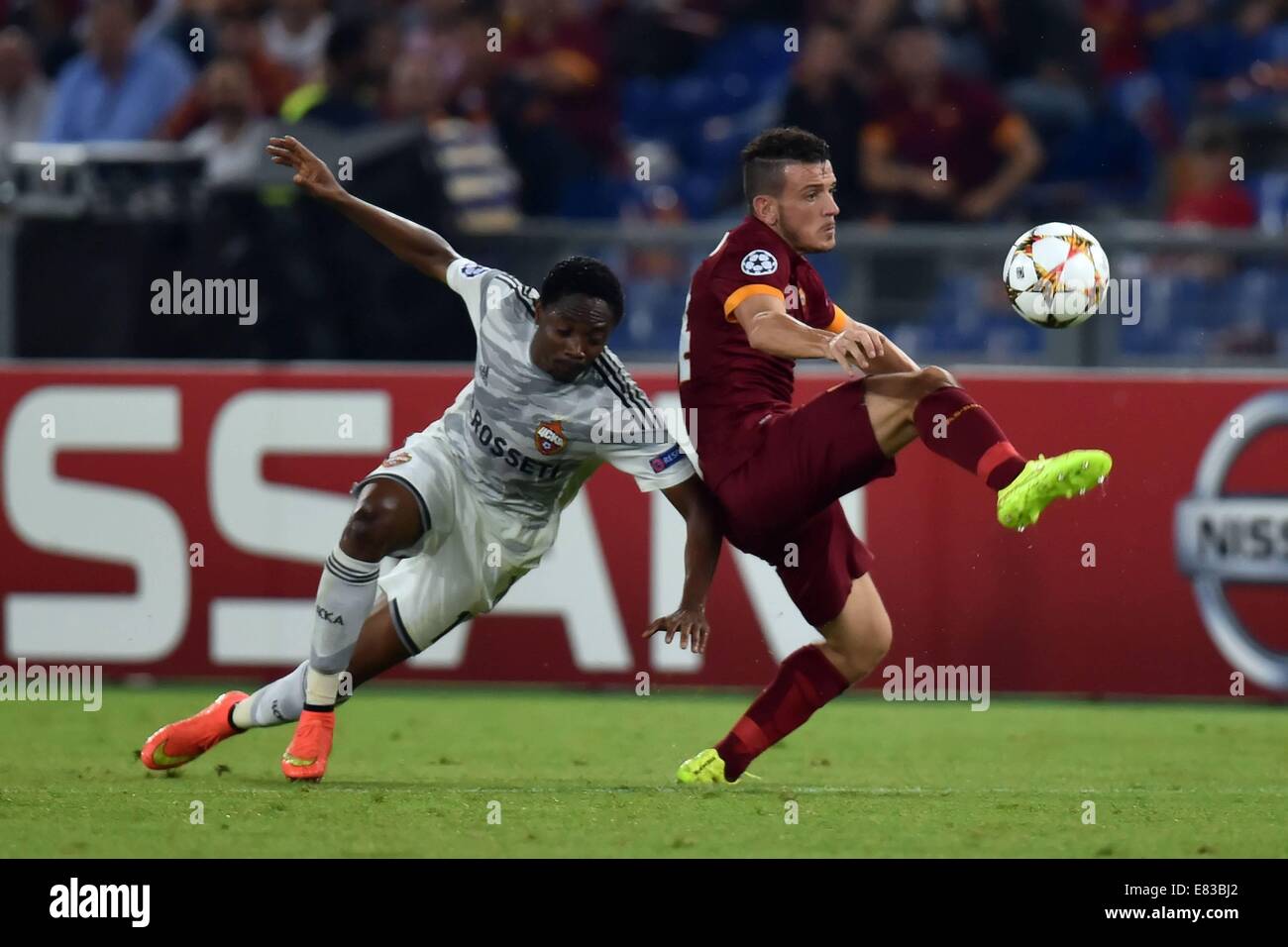 Rome, Italy. 17th Sep, 2014. UEFA Champions league football, group stages. AS Roma versus CSKA (Russia). Ahmed Musa CSKA and Alessandro Florenzi As Roma challenge for the ball © Action Plus Sports/Alamy Live News Stock Photo