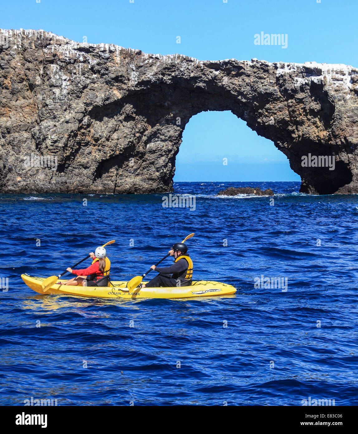 Kayakers by Arch Rock in Channel Islands National Park Stock Photo