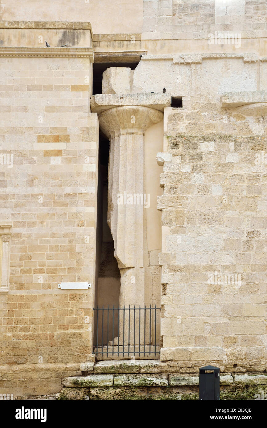 Ancient column in the medieval wall Stock Photo