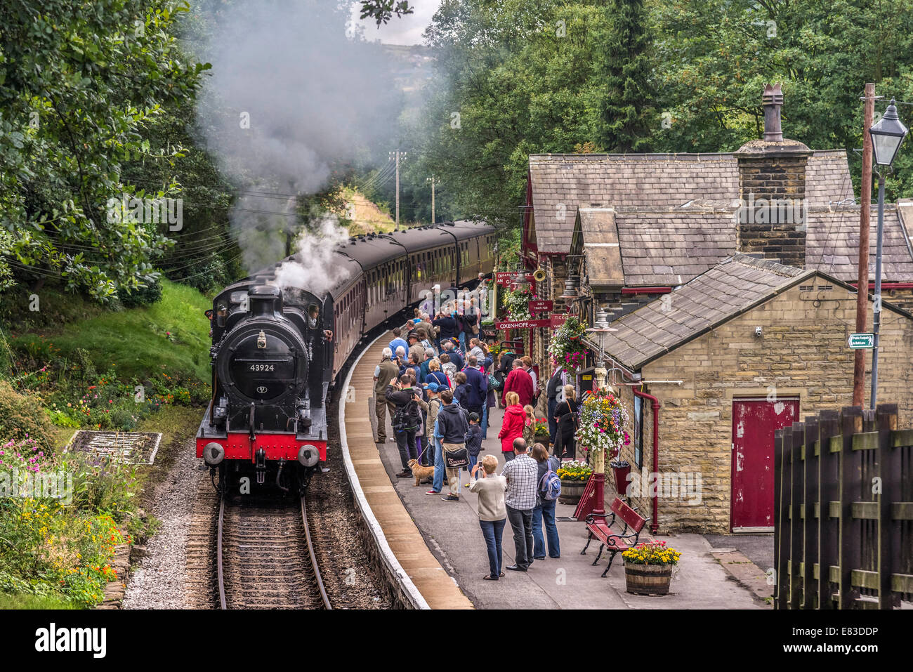 LMS Class 4F 060 'Big Goods' engine hauling a passenger train at Haworth station on the