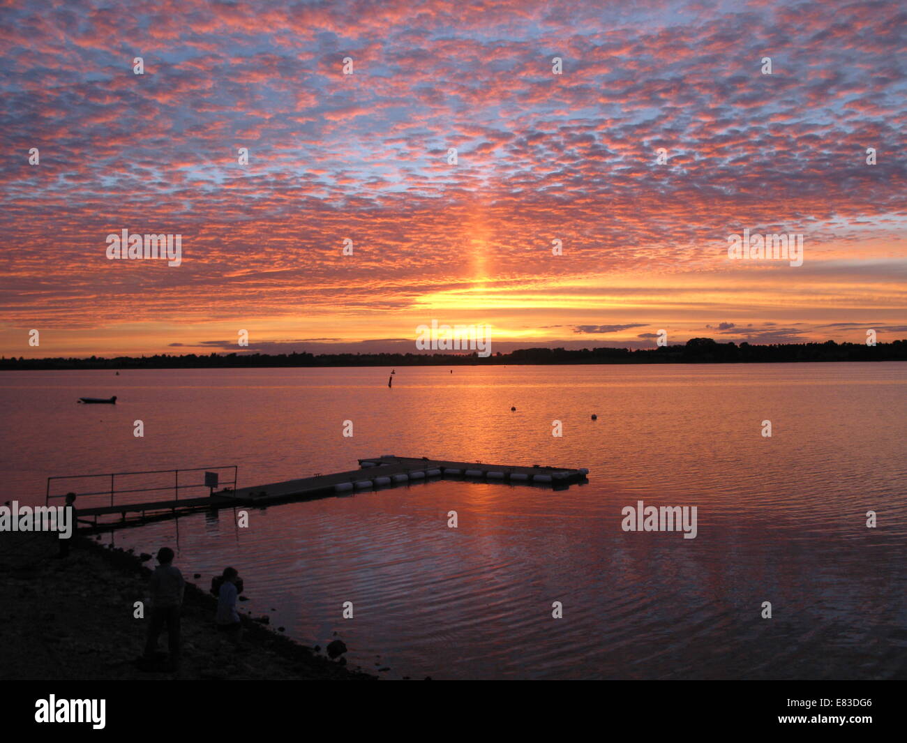beautiful sunset over draycote water lake Stock Photo