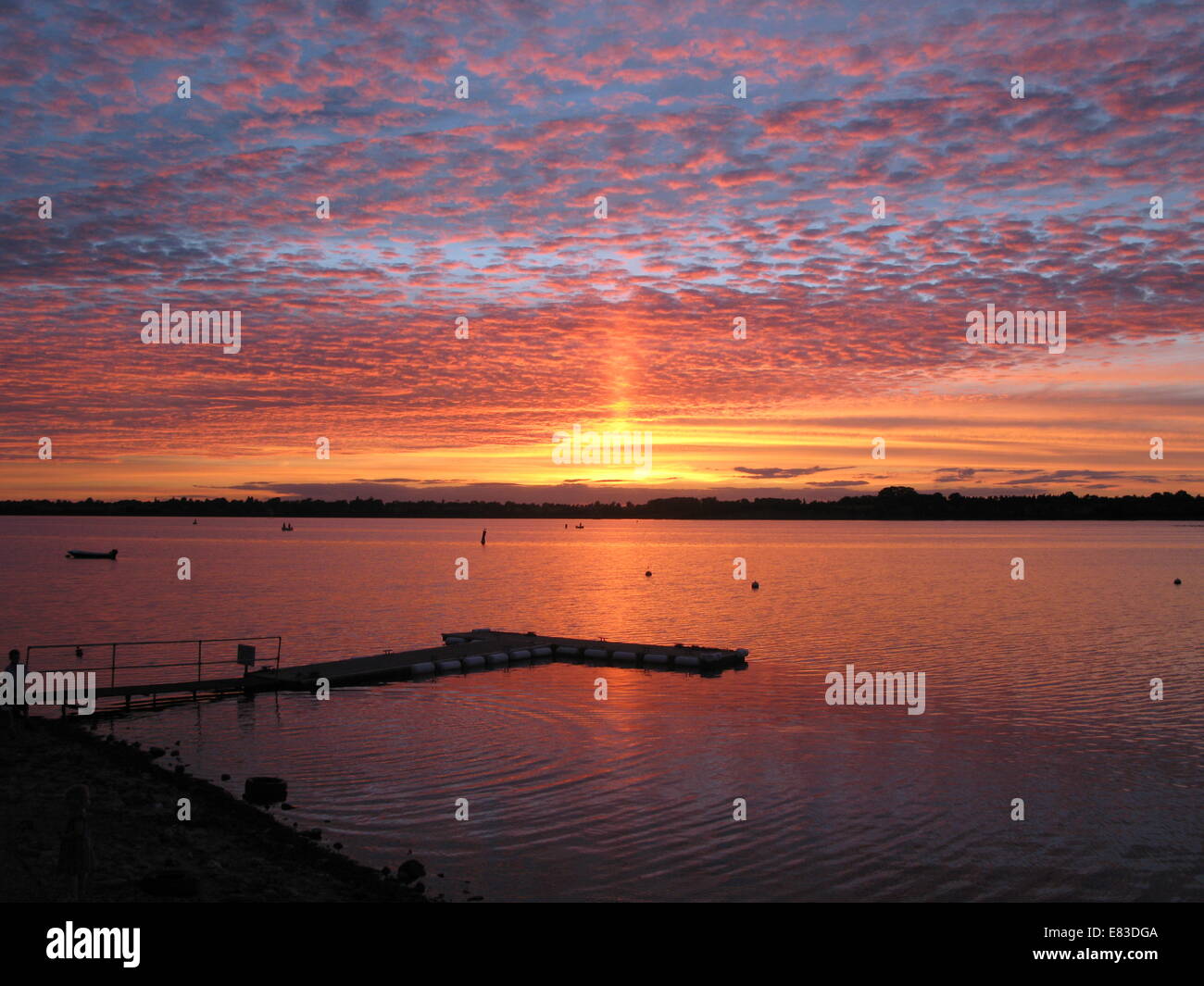 beautiful sunset over draycote water lake Stock Photo