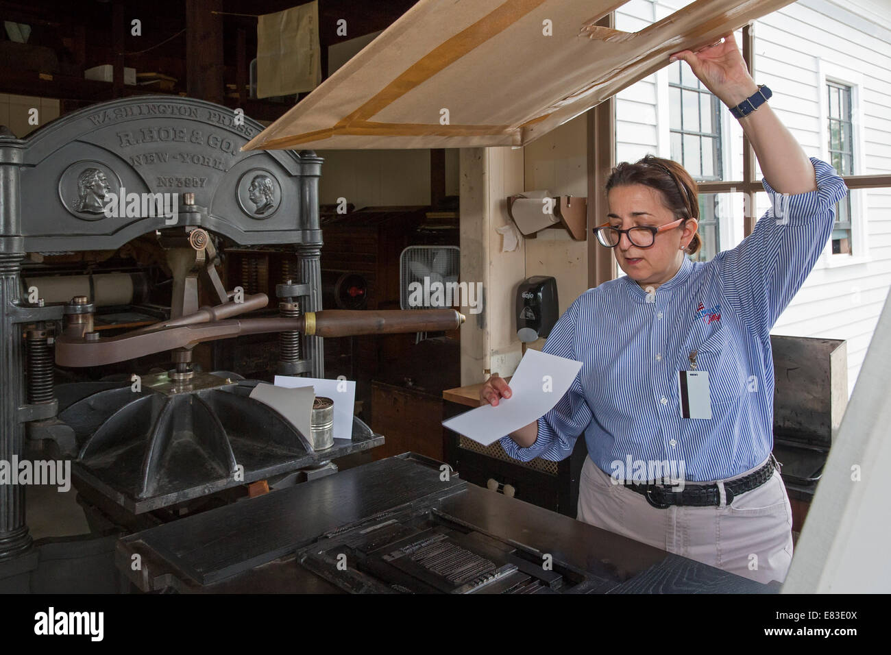 Dearborn, Michigan - An artisan in the printing office at Greenfield Village. Stock Photo