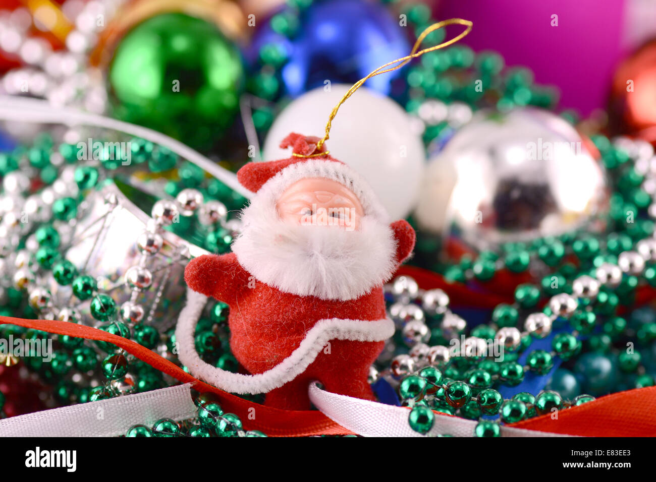 Santa Claus with Christmas toys, new year decoration Stock Photo