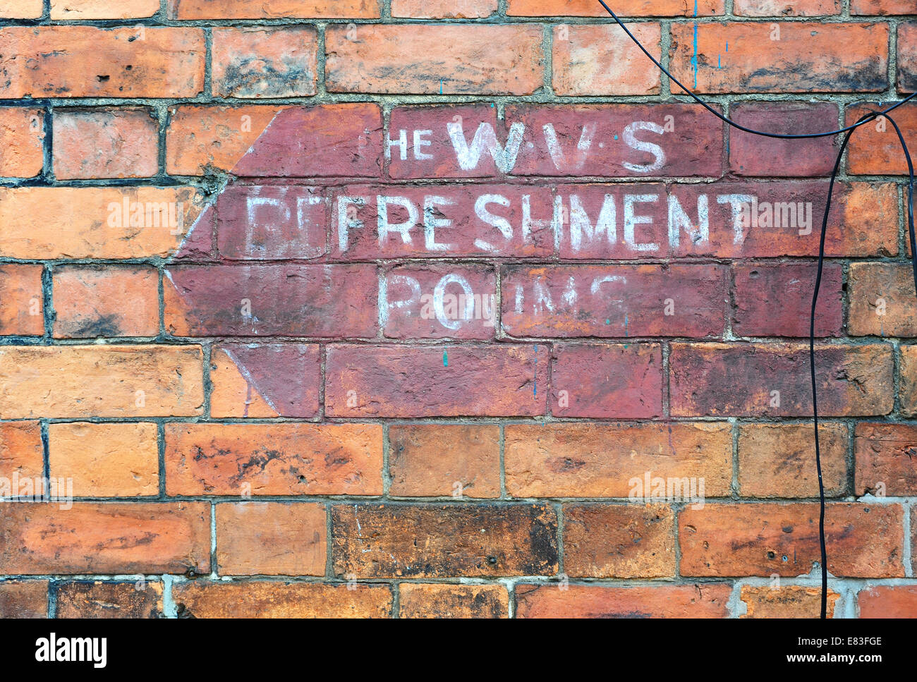 WW2 Sign on brick wall stating Womens Volunteer Service Refreshment rooms Stock Photo