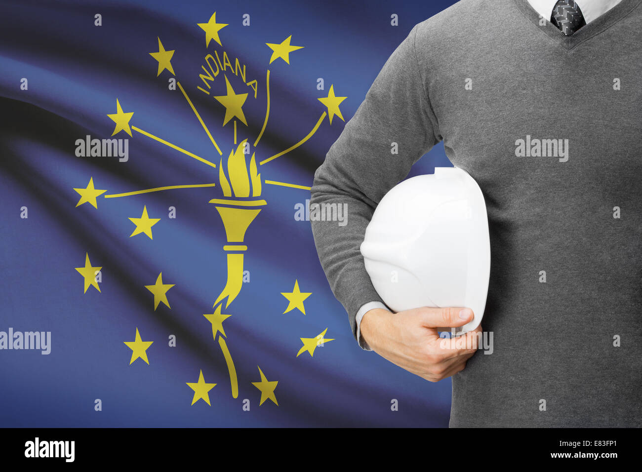 Engineer with flag on background series - Indiana Stock Photo