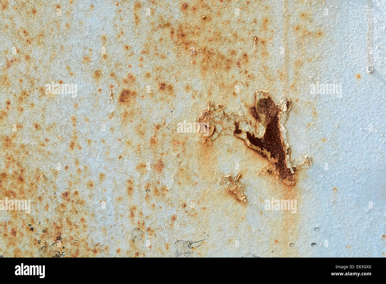scratched ripped metal plating, grunge background Stock Photo