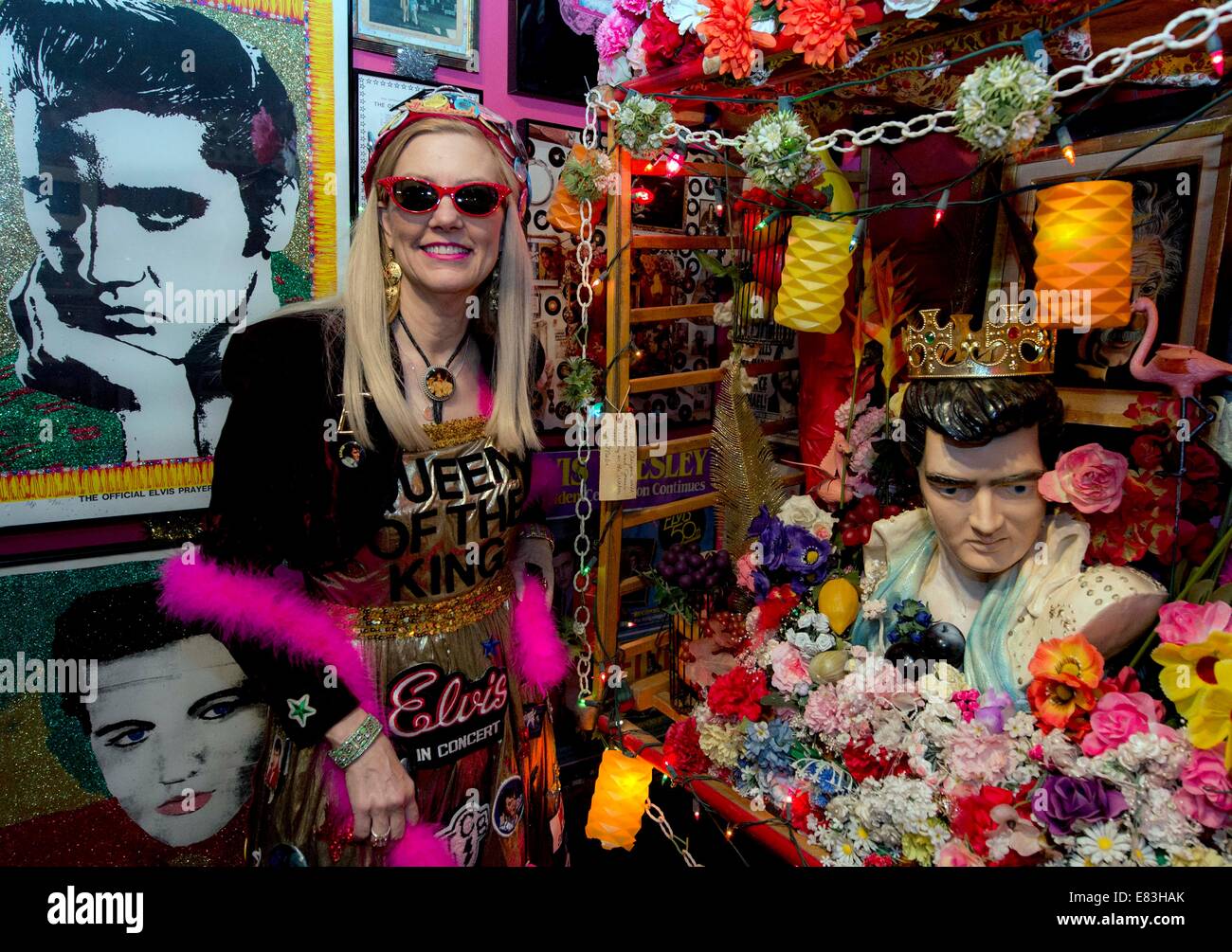 Cornelia, Georgia, USA. 29th Sep, 2014. JONI MABE stands among some of her Elvis Presley-related items displayed at Joni Mabe's Panoramic Encyclopedia of Everything Elvis. Ms. Mabe has collected some 30,000 items related to ''The King, '' and has them on display at the Loudermilk Boarding House Museum 70 miles north of Atlanta. Credit:  Brian Cahn/ZUMA Wire/Alamy Live News Stock Photo