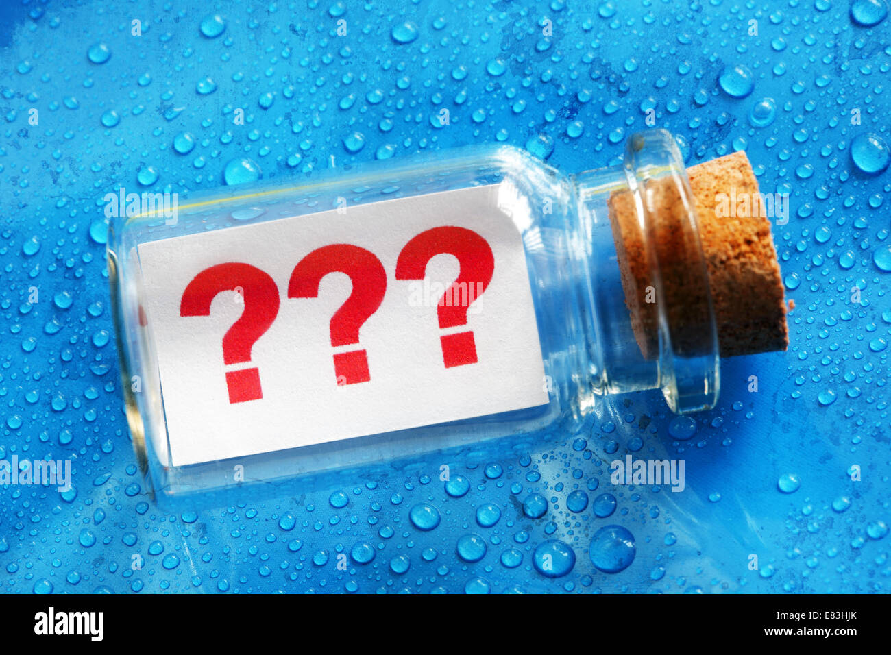 Question mark message in a bottle Stock Photo