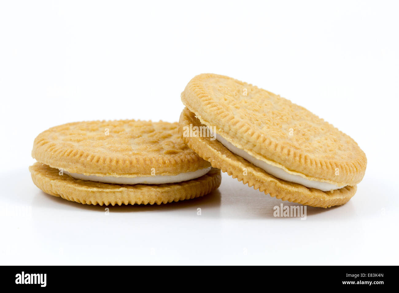 Vanilla cookies with cream filling on white background Stock Photo