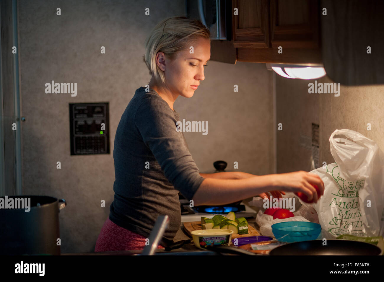 Home cooking in kitchen hi-res stock photography and images - Alamy