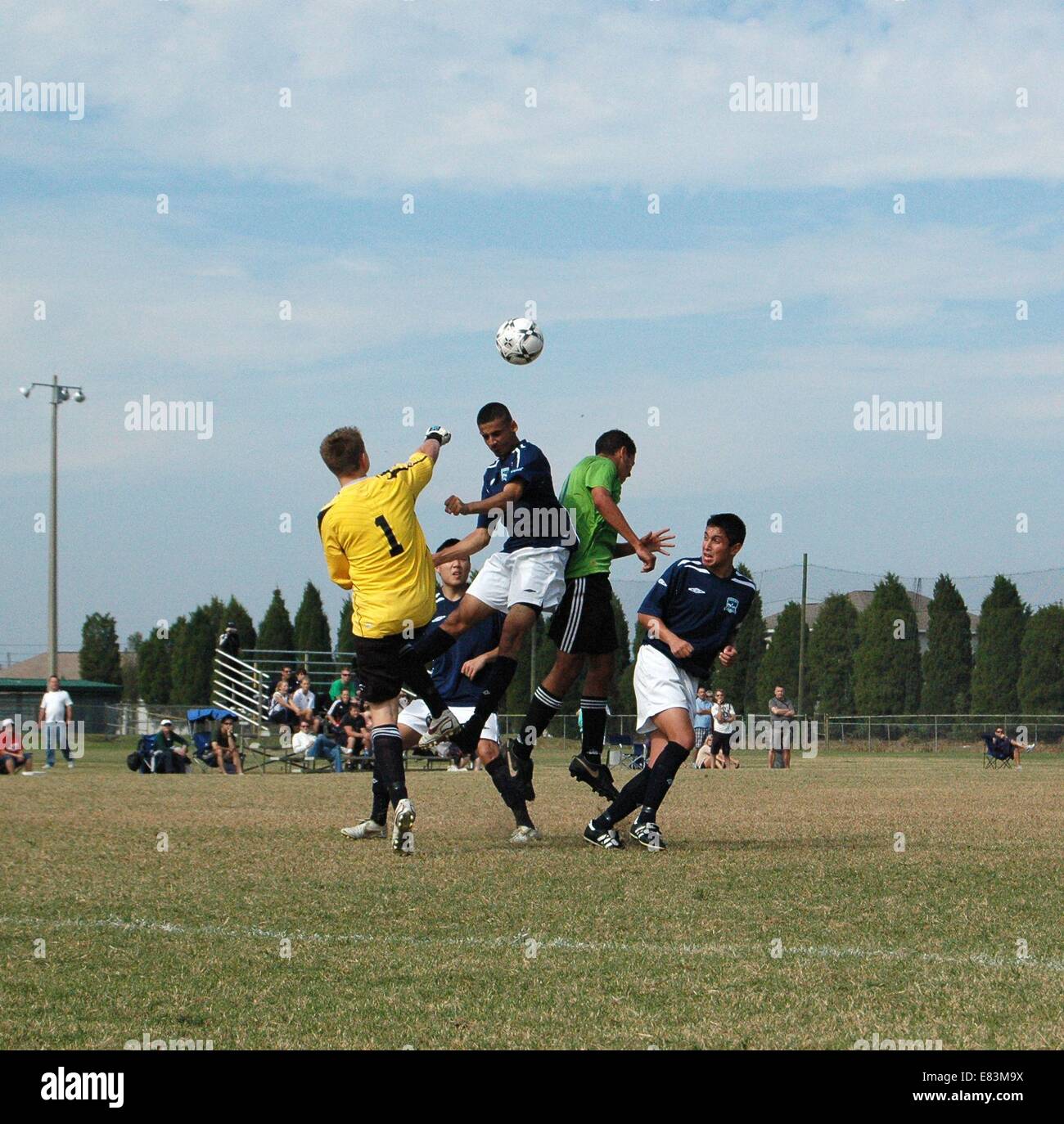 Nov. 21, 2009 - Land O'Lakes, FL - Four pictures from the United Soccer League's Super Y-League finals at the Land O'Lakes recreation center. Players' names not available.Photo #2: The Coastal FC goalkeeper breaks up a play in front of goal by punching the ball away from a crowd of Hillsborough United attackers. (Credit Image: © St. Petersburg Times/ZUMA Wire) Stock Photo