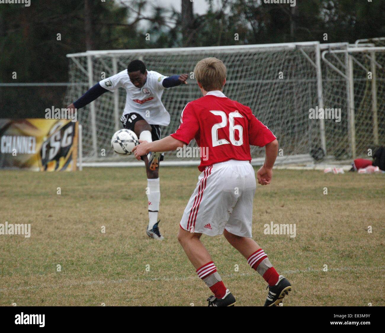 Nov. 21, 2009 - Land O'Lakes, FL - Four pictures from the United Soccer League's Super Y-League finals at the Land O'Lakes recreation center. Players' names not available.Photo #1: A New York Magic player attempts a long range shot during his team's opening group stage game against the Chicago Fire. The two.sides finished the match tied at 3-3. (Credit Image: © St. Petersburg Times/ZUMA Wire) Stock Photo