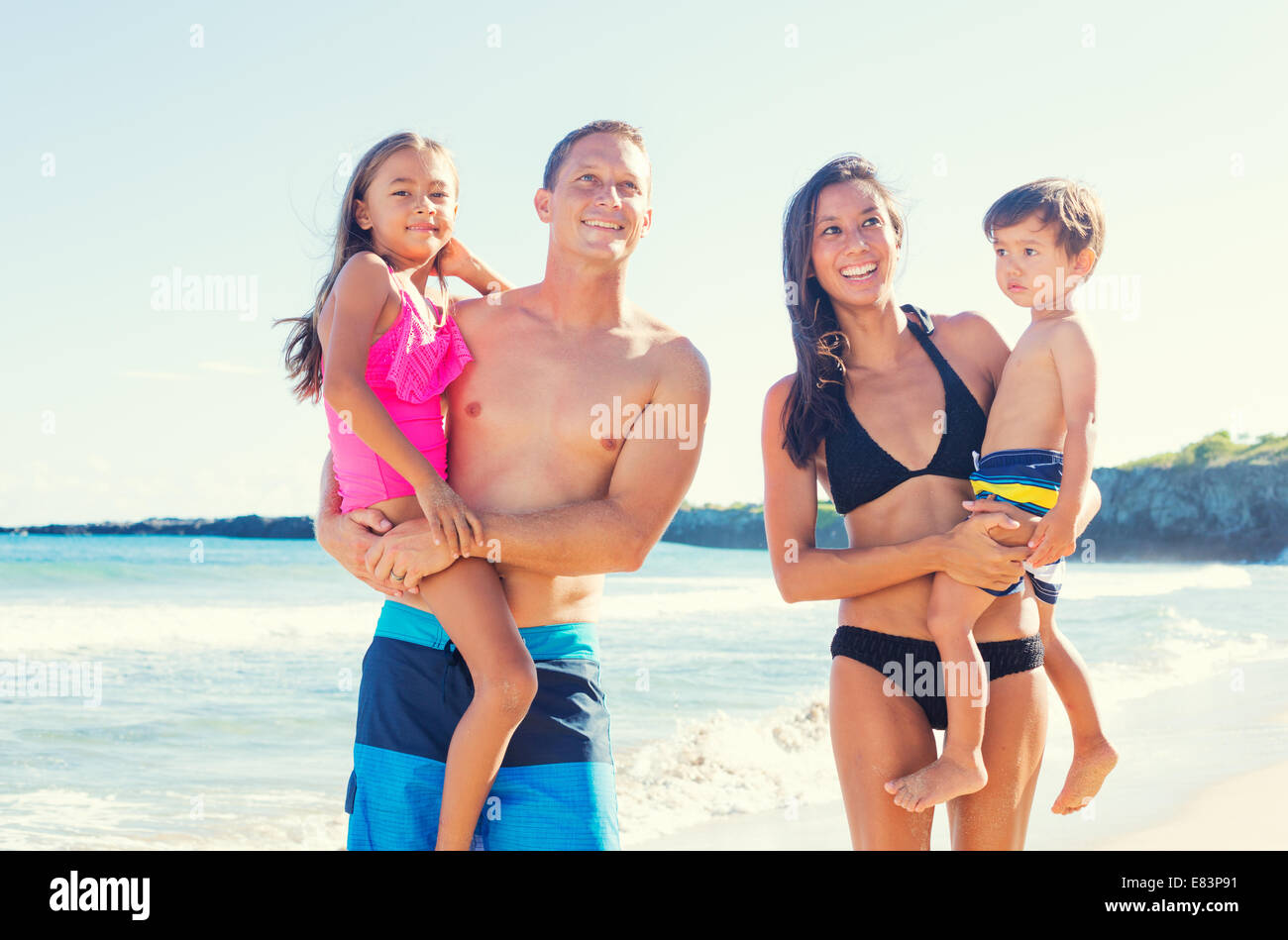 Family beach sunny swimsuit hi-res stock photography and images - Alamy