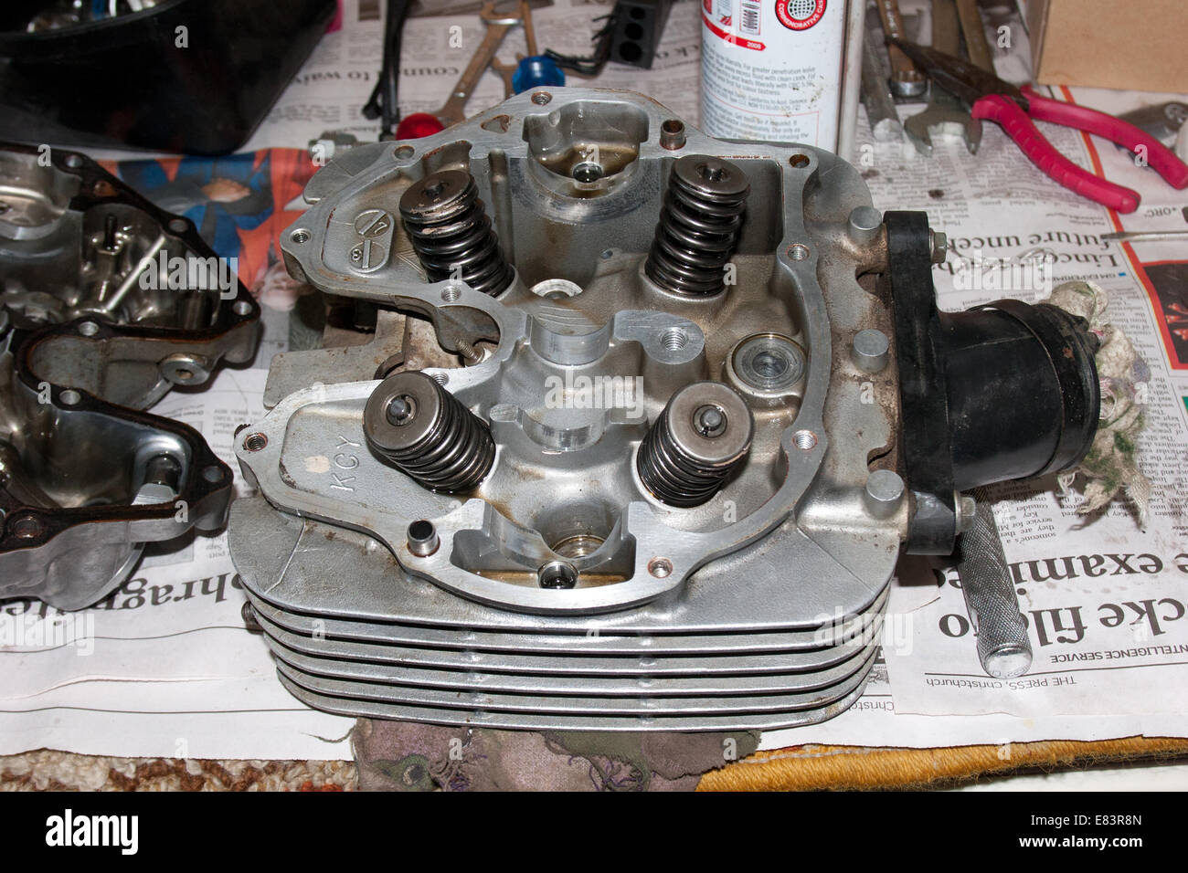 Motorcycle Maintenance cylinder head with valve springs Stock Photo