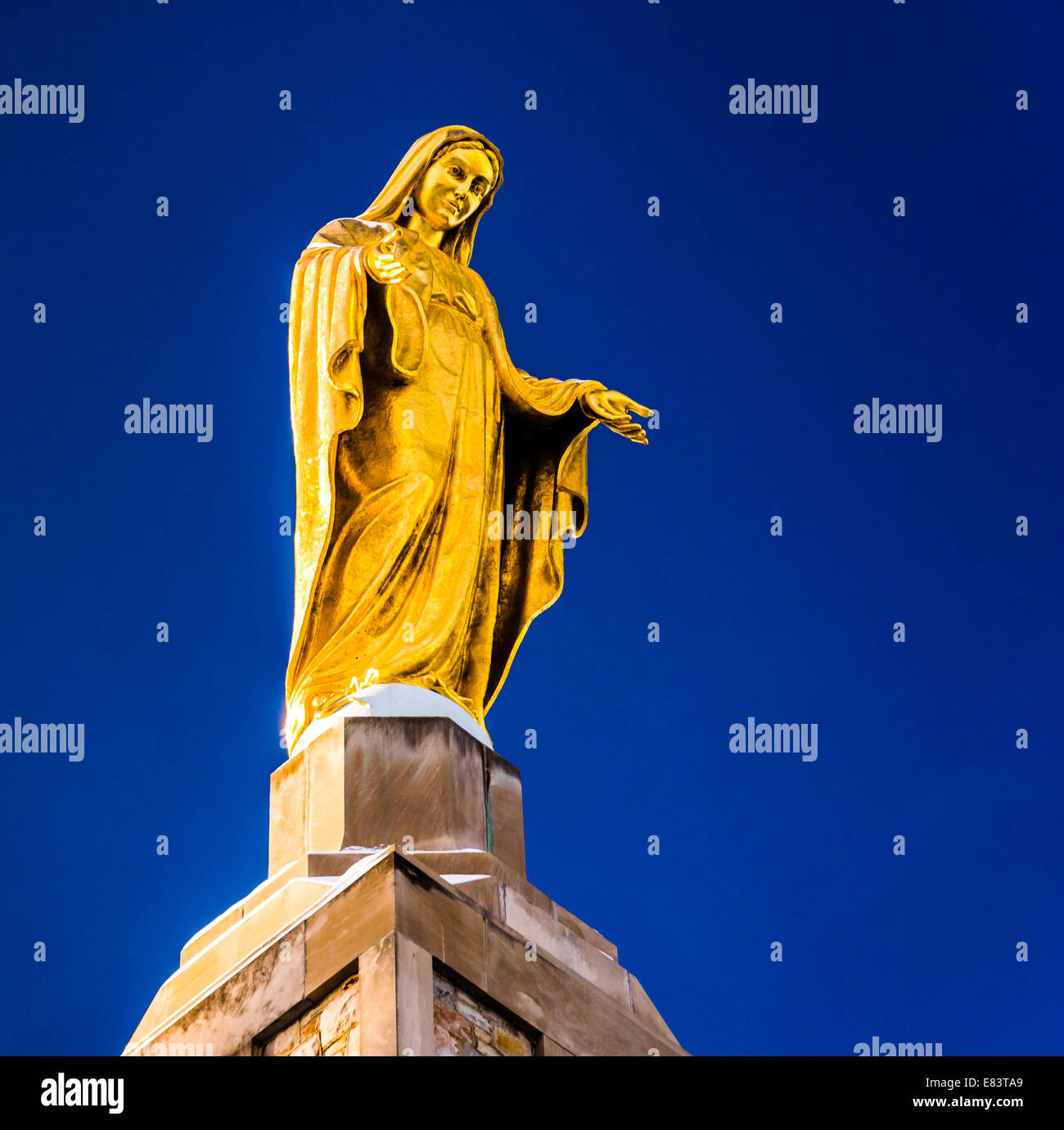 Statue on top of The National Shrine Grotto of Lourdes in Emmitsburg
