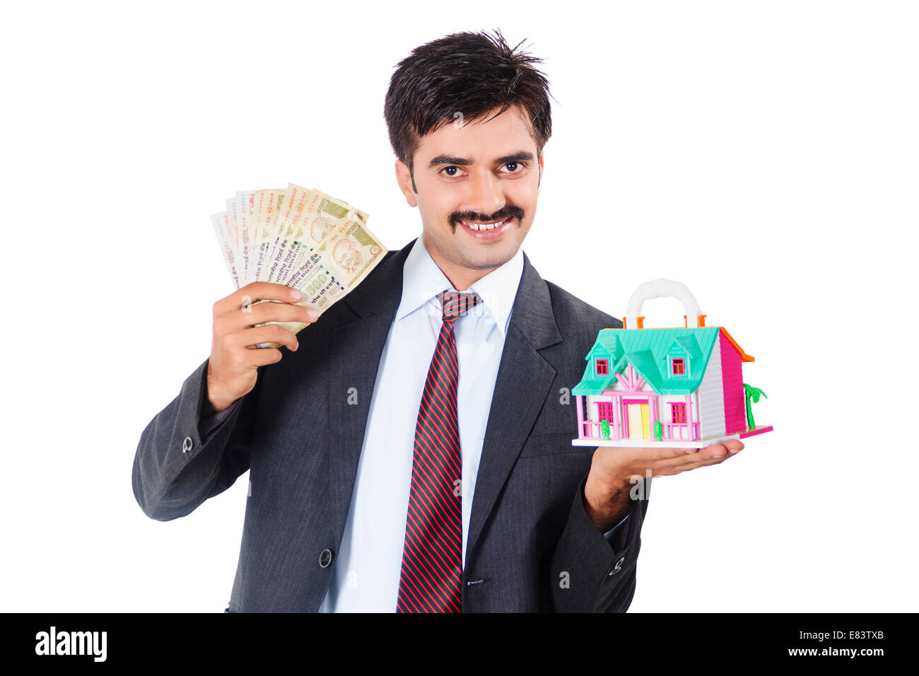 Indian Business Man Saving Money Real Estate Stock Photo - 