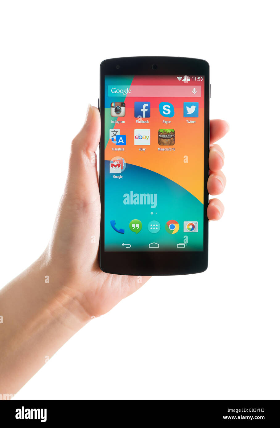 Studio shot of woman hand holding brand new Google Nexus 5, powered by Android 4.4 version, manufactured by LG Electronics. Stock Photo