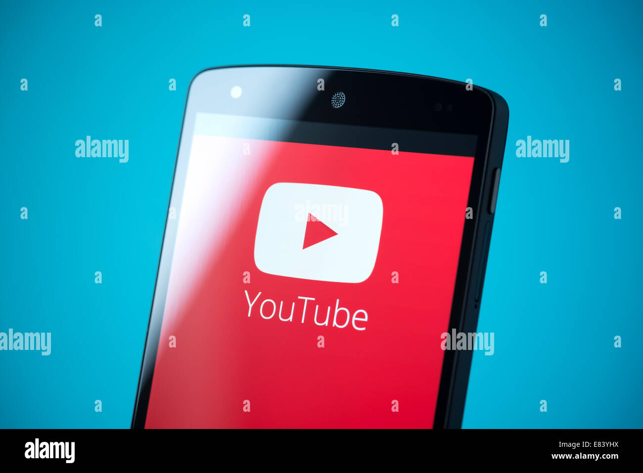 Close-up shot of brand new Google Nexus 5, powered by Android 4.4 version, with YouTube logotype on a screen. Stock Photo