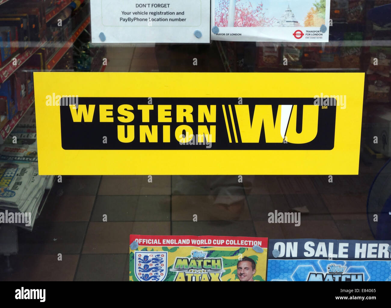 Western Union money transfer sign in shop window, London Stock Photo