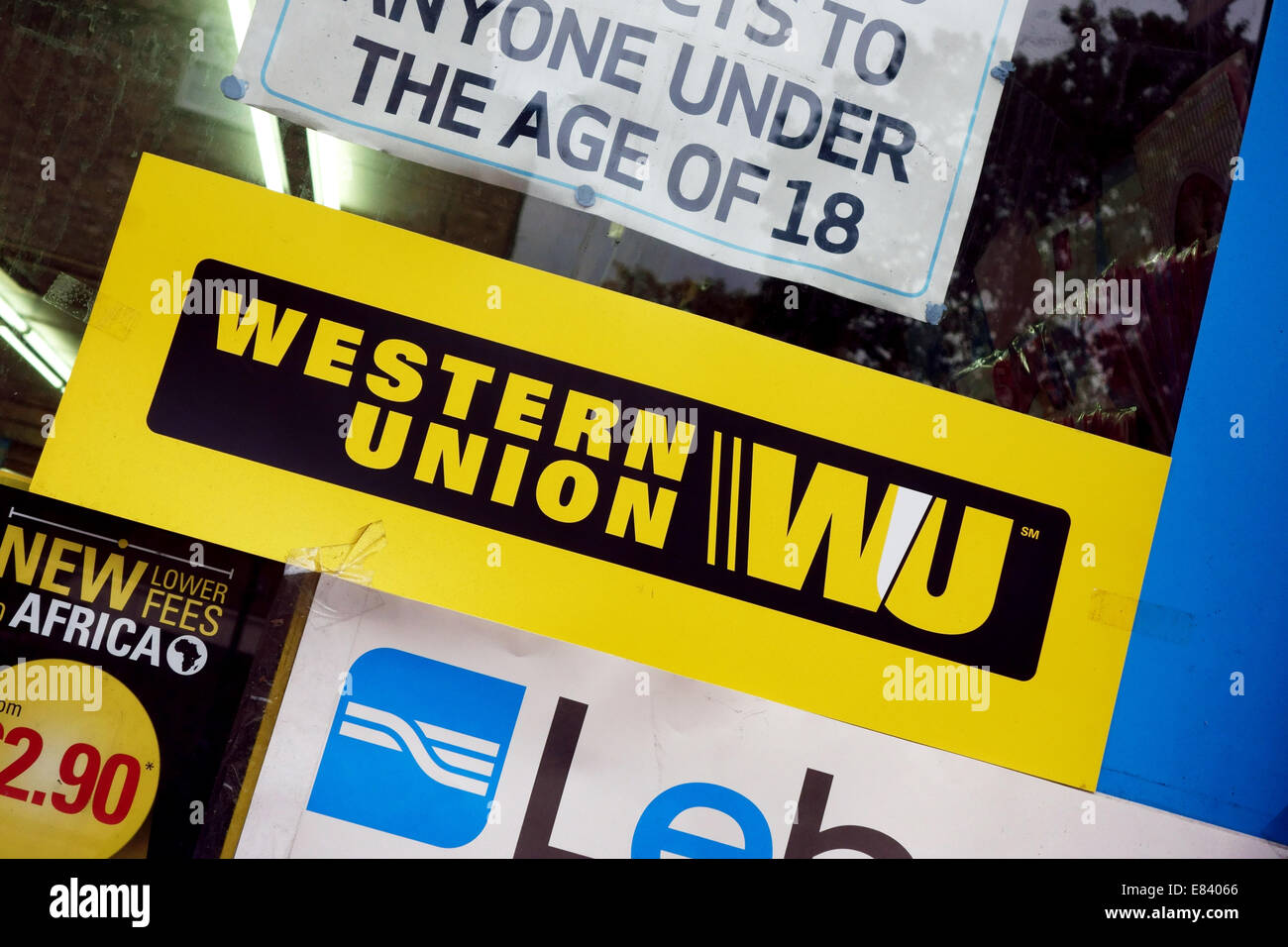 Western Union money transfer sign in shop window, London Stock Photo