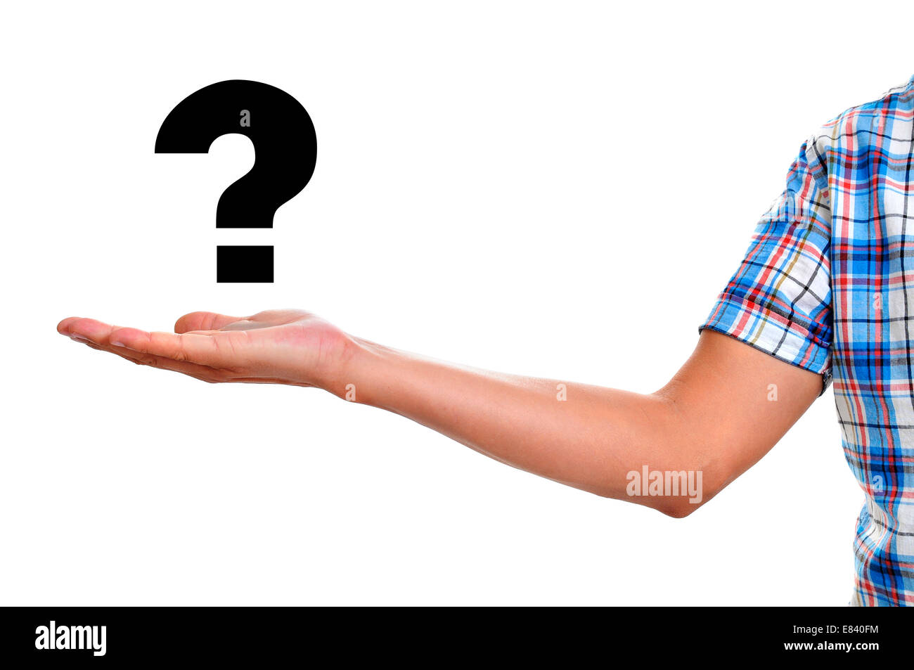 the hand of a young man holding a question mark on a white background Stock Photo