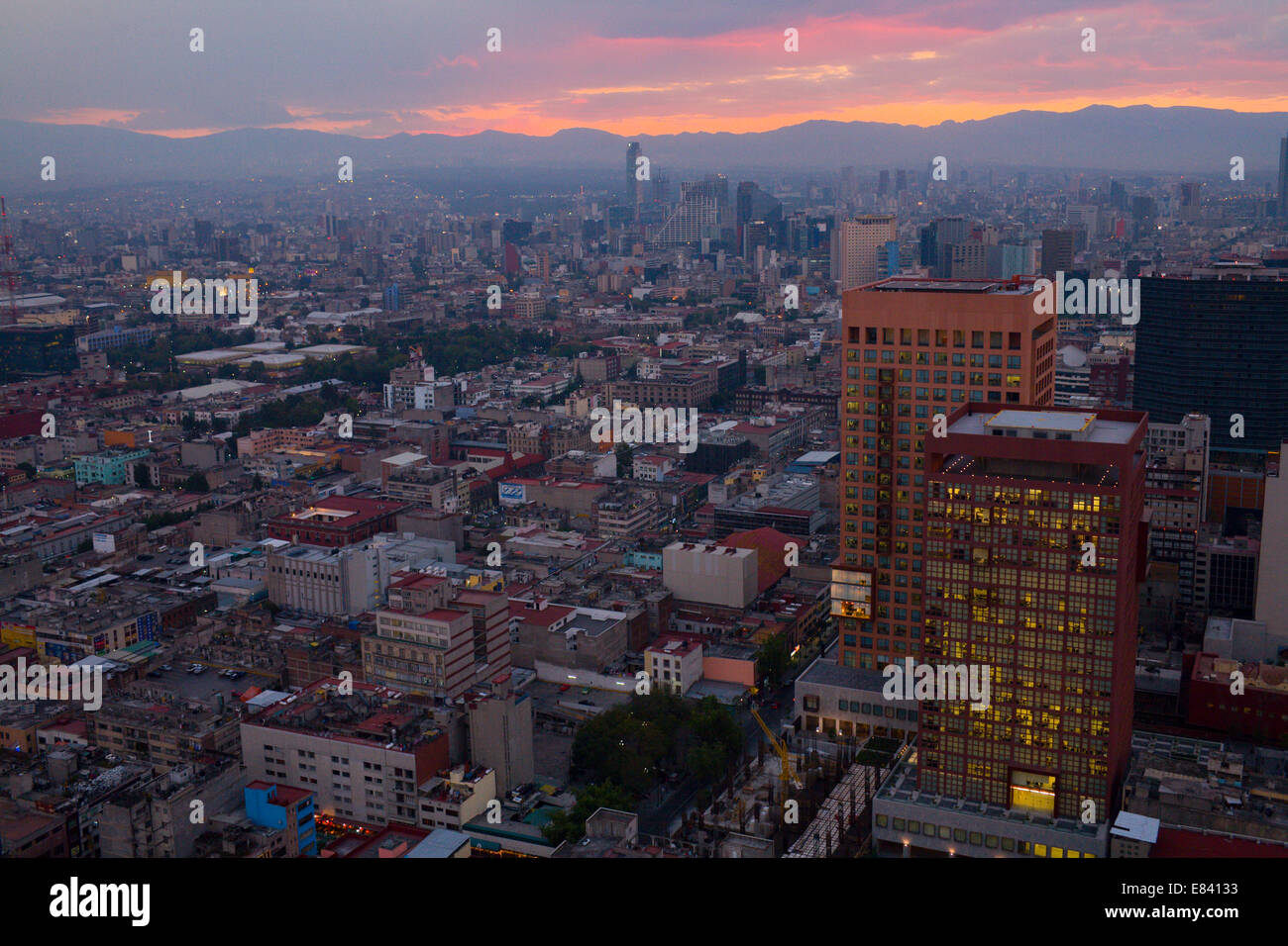 View across of the city at sunset, from Torre Latinoamericana, Mexico City, Federal District, Mexico Stock Photo
