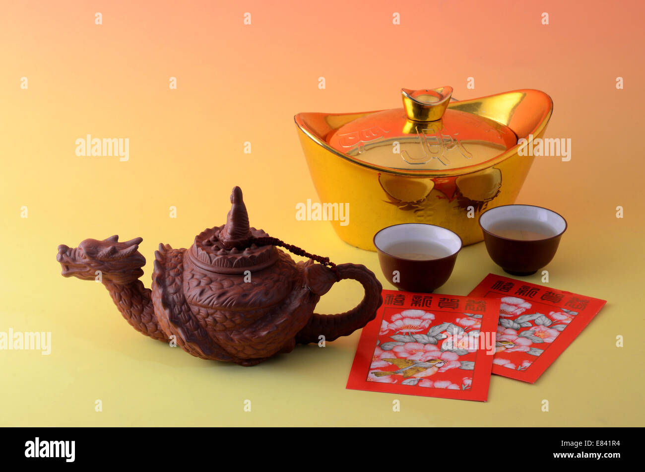 Dragon design tea pot and gold ingot during Chinese New Year festival