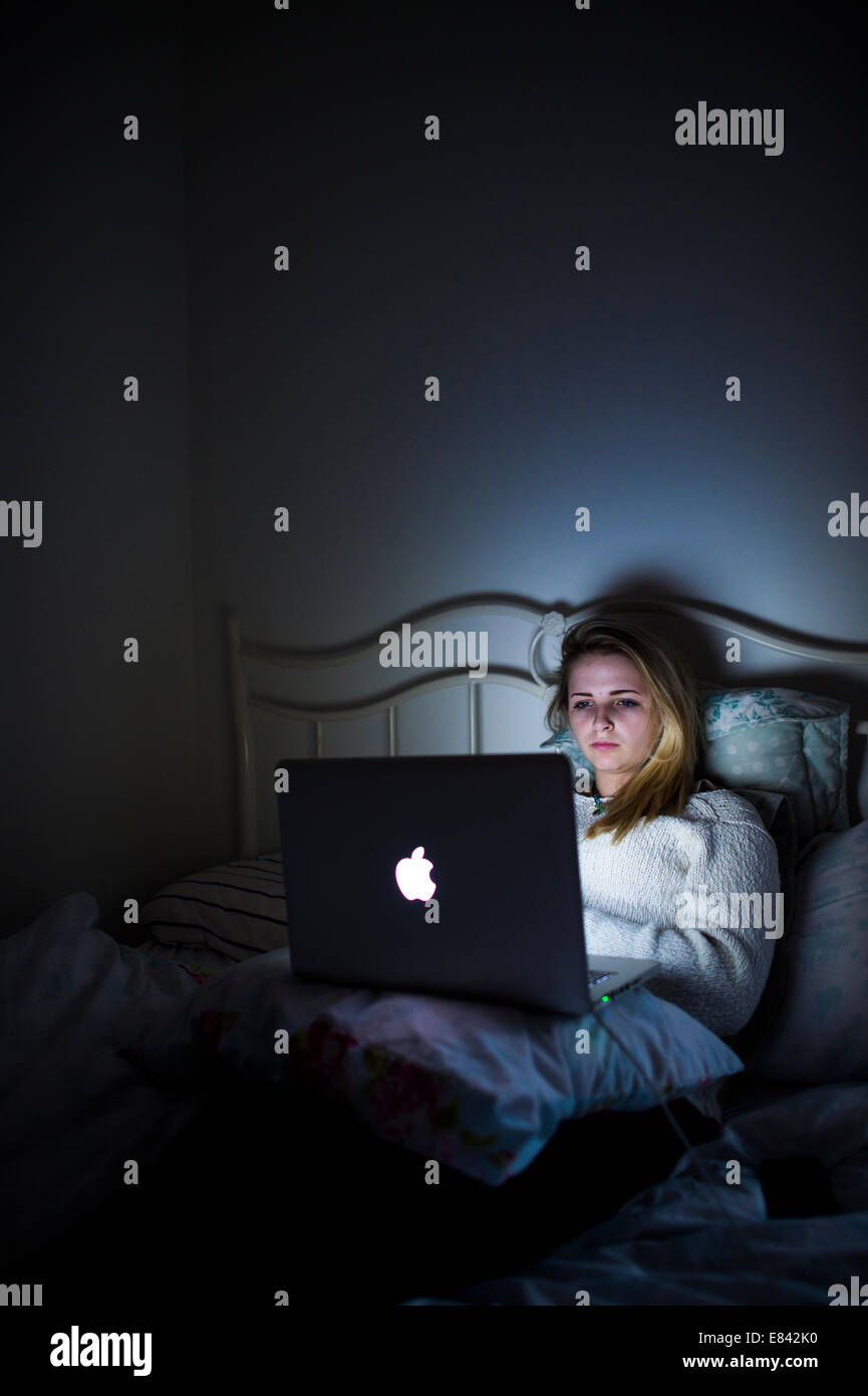 A 15 Year Old Teenage Girl Alone In Her Bedroom In The Dark